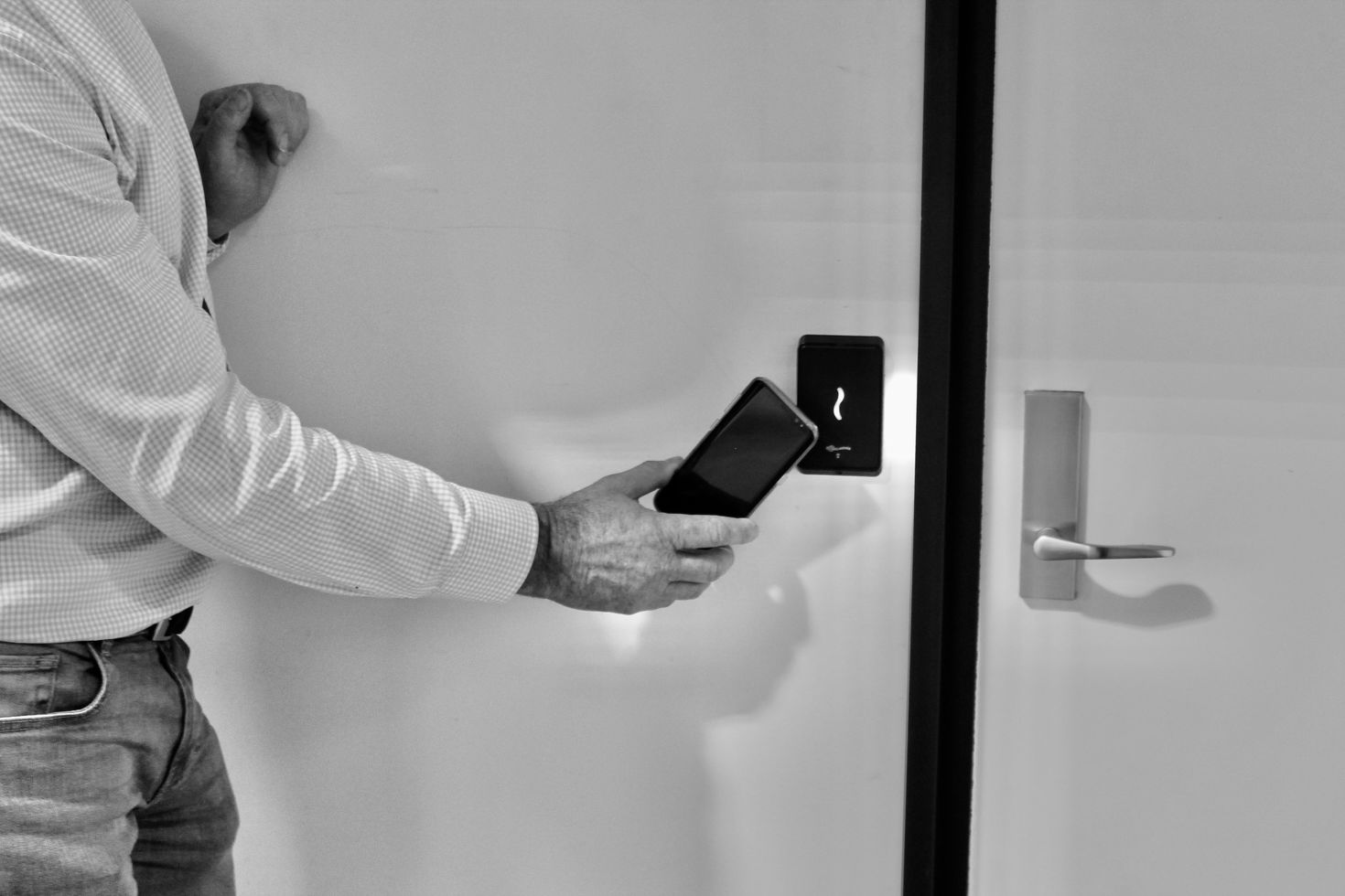 A man unlocking door